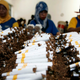 Workers roll cigarettes in a factory in Sidoarjo, East Java province February 2, 2009. The company's production manager said on Monday that the production of cigarettes has decreased after Indonesia's Ulema Council (MUI) issued a fatwa prohibiting smoking in public places and by pregnant women and children. Indonesian smokers and the country's tobacco industry have slammed a move by the nation's top Islamic body to place restrictions on tobacco use by Muslims, calling it an interference in private lives. Health campaigners welcomed the move, but said the government now needed to do more if there was to be any impact on curbing smoking in the world's fifth largest tobacco market.